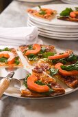 Pizza topped with pancetta, brie and papaya