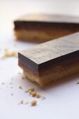 Peanut, toffee and chocolate slices