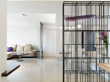 Modern interior with wire bookcase