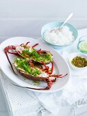 Steamed lobsters with ginger