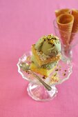 An ice cream sandwich made with pistachio ice cream and lemon cake