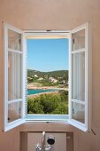 Open window above bathtub