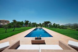 Sitting area alongside outdoor pool