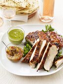 Barbecued turkey with dips, flatbread and rosé wine