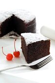 Moist chocolate cake dusted with icing sugar (Morocco)