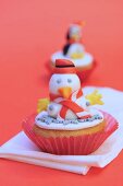 Cupcake with snowman decoration