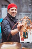 fisherman presenting lobster