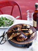 Grilled chicken on a wooden board