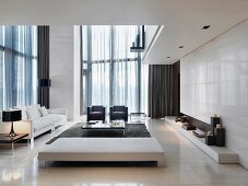 Living room with an open ceiling in elegant designer style