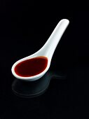 A spoonful of sweet chilli sauce (Asia)