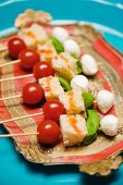 Tomatoes and mozzarella on skewers