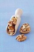 Walnuts and a wooden scoop