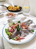 Soused herring with bacon sauce