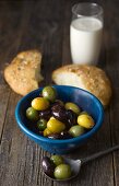 Unleavened bread with olives and Ayran (Turkish yogurt drink)