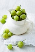 Gooseberries in a white pitcher