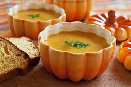 A bowl of cream of pumpkin soup