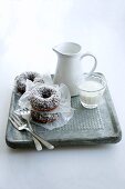 Doughnuts with coconut flakes and milk