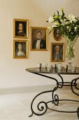 Provence country house reception with oil paintings and wrought iron table