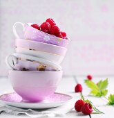 Fresh raspberries in a stack of cups