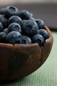Blueberries in an old wooden bowl