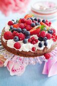 Chocolate cake with cream cheese and berries
