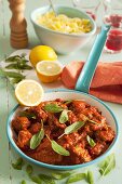 Veal meatballs with lemon and sage in tomato sauce