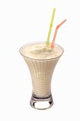 An ice cream shake with two straws