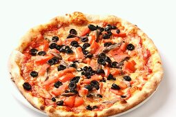 Pizza Napoletana with tomatoes, olives and sardines