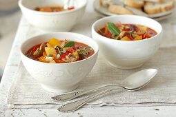 Duck soup with pepper, tomatoes and thyme