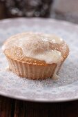 An apple muffin with cinnamon sugar