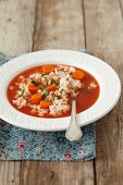 Tomato soup with rice and carrots