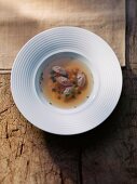 Game broth with liver dumplings