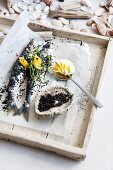 Fish, baked in sesame seeds, with mango butter