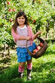 A girl with an apple basket