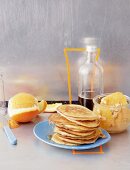 Pancakes with orange fruit salad