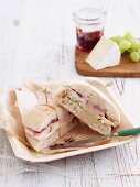 Turkey sandwich with brie and cranberry sauce
