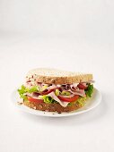 Ein Schinken-Tomaten-Sandwich