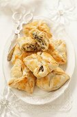 Puff pastry pockets with quark, olives and capers (Christmas)