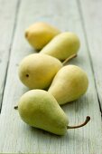 Yellow pears on a wooden table