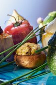 A mushroom filled with egg, onion, goat's cream cheese and grated Parmesan