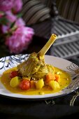 Lamb shank with curried vegetables