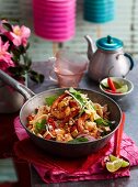 Fried Thai noodles with tofu, chicken and prawns