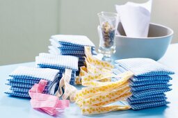 Stacked scented sachets filled with dried flowers