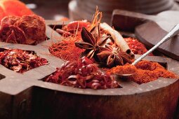 An arrangement of spices with dried chillis and star anise
