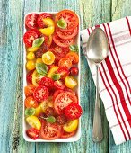 Sliced Heirloom Tomato Salad on a Serving Dish; From Above