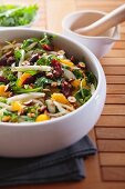 Salad with fennel, oranges, plums and nuts