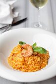 Tomato risotto with prawns and basil