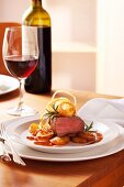 Sirloin of beef with sauté potatoes, onion rings and rosemary