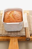 Freshly baked banana bread in a loaf tin