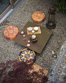 Tea ceremony in contemporary courtyard
